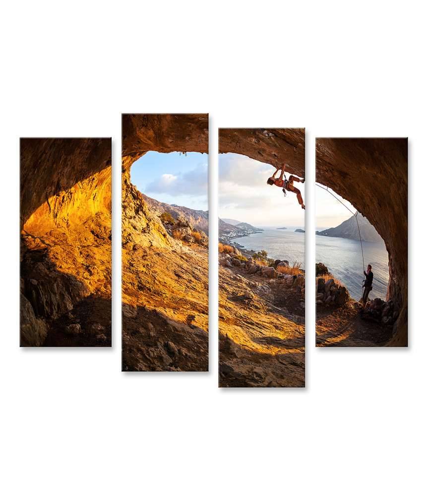 Islandburner Bild auf Leinwand Junge Frau klettert in Höhle mit atemberaubender Aussicht im Hintergrund Fabrikladen