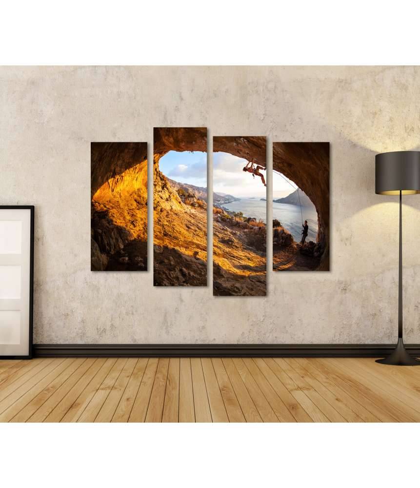 Islandburner Bild auf Leinwand Junge Frau klettert in Höhle mit atemberaubender Aussicht im Hintergrund Fabrikladen